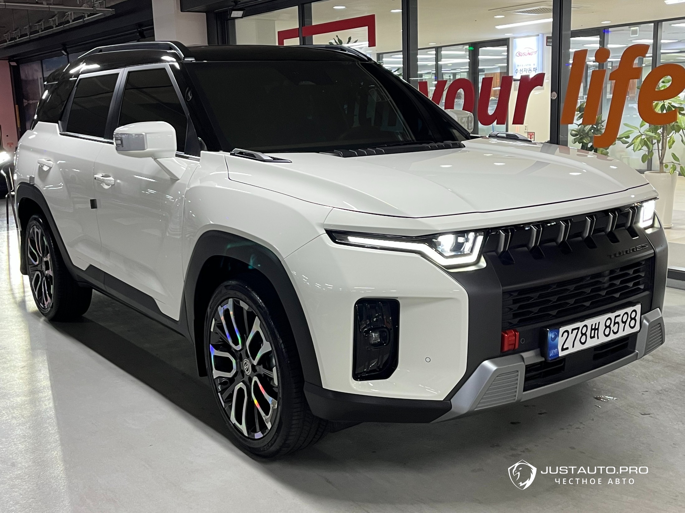 Автомобиль KG_Mobility_Ssangyong Torres