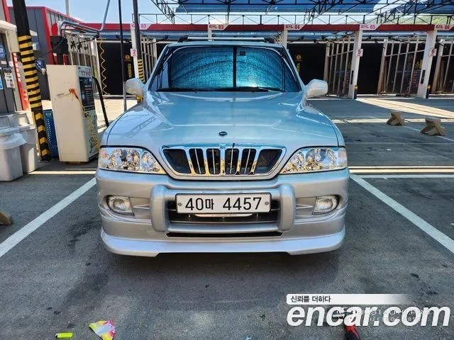 Автомобиль KG_Mobility_Ssangyong Musso