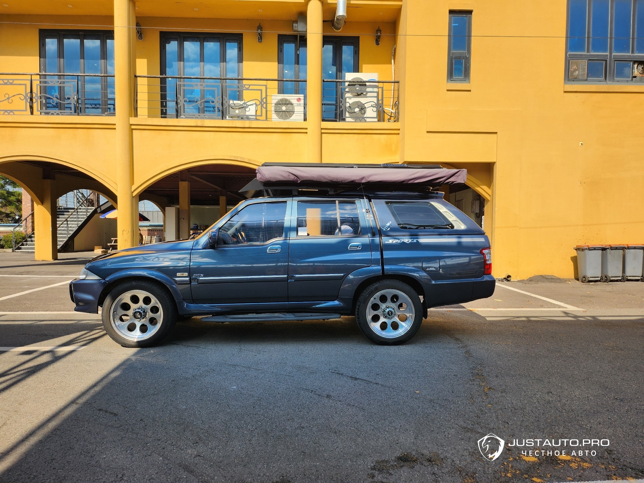 Автомобиль KG_Mobility_Ssangyong Musso