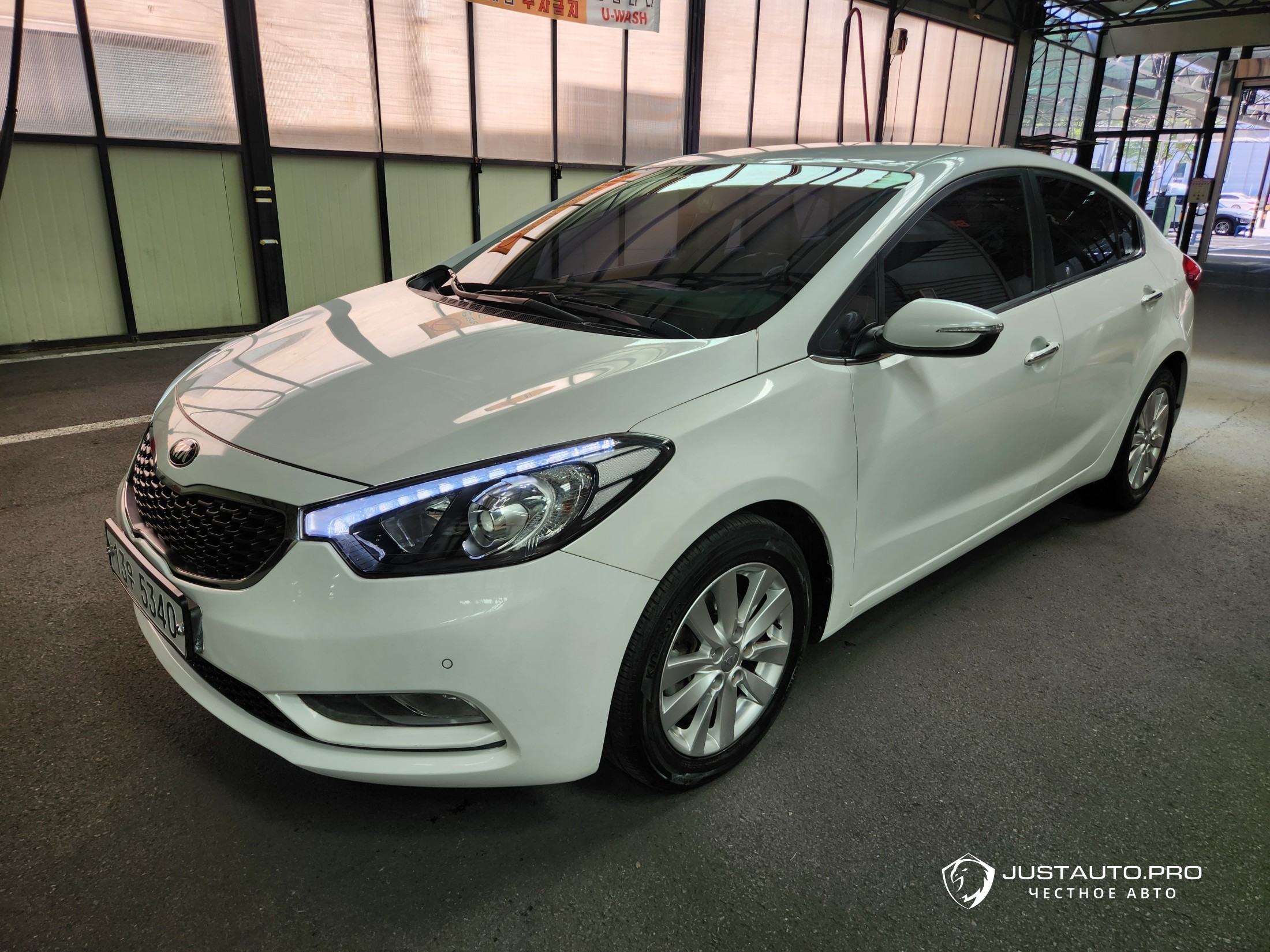 Автомобиль Kia K3