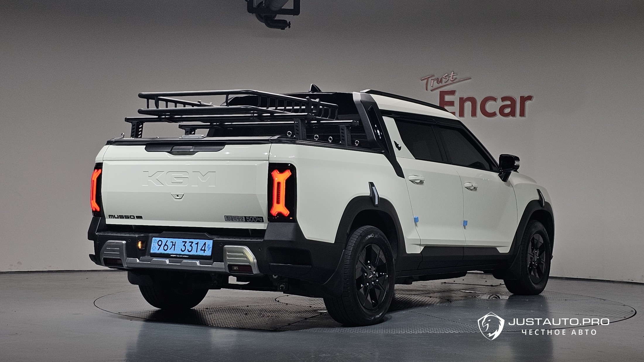 Автомобиль KG_Mobility_Ssangyong Musso