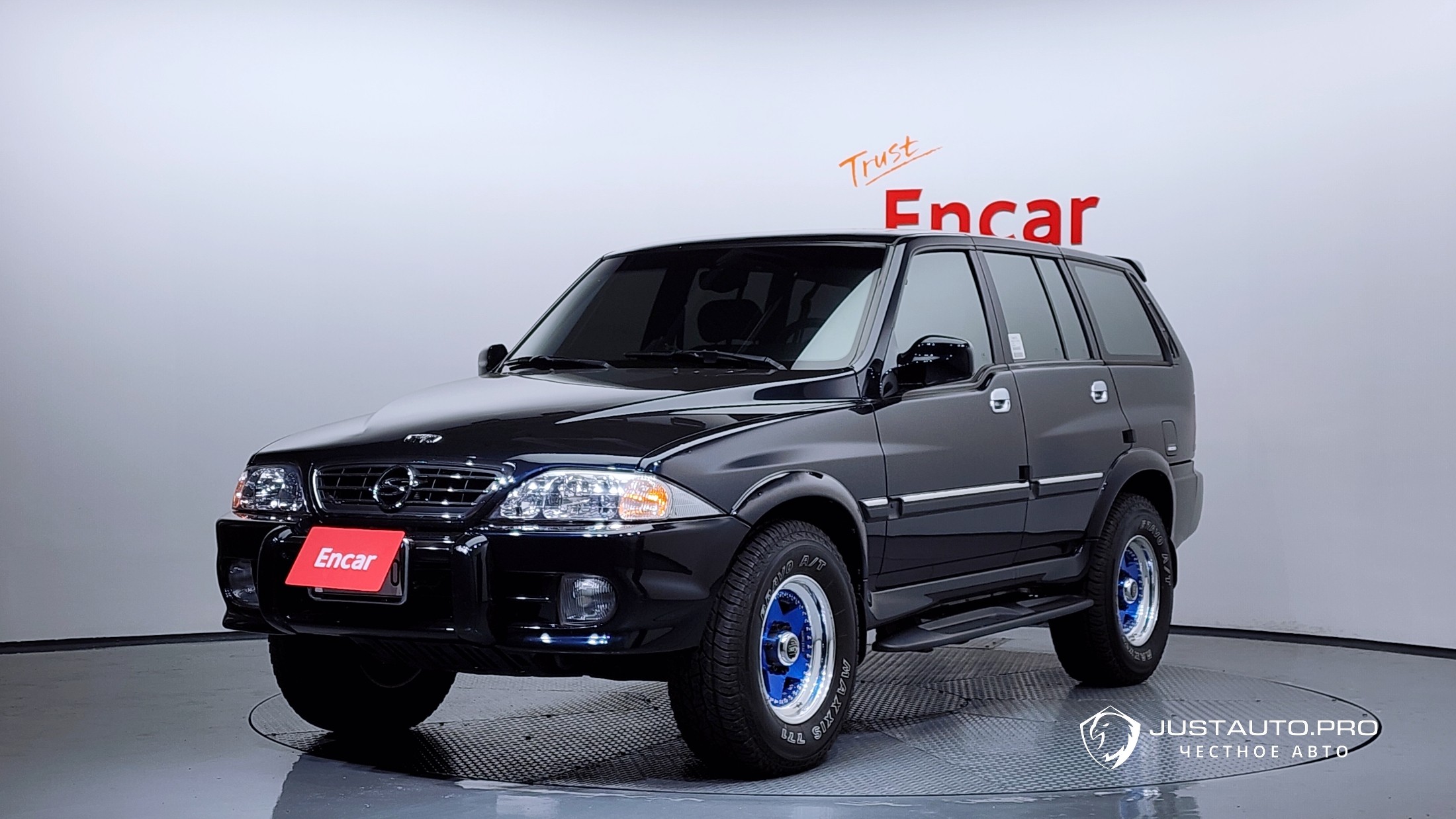 Автомобиль KG_Mobility_Ssangyong Musso