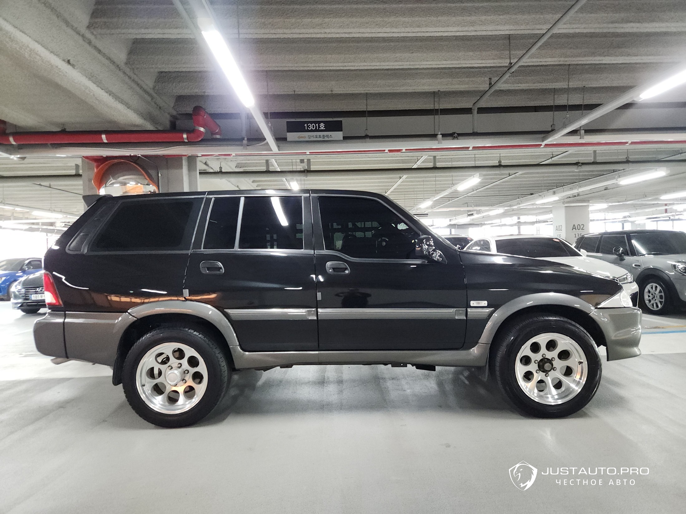 Автомобиль KG_Mobility_Ssangyong Musso