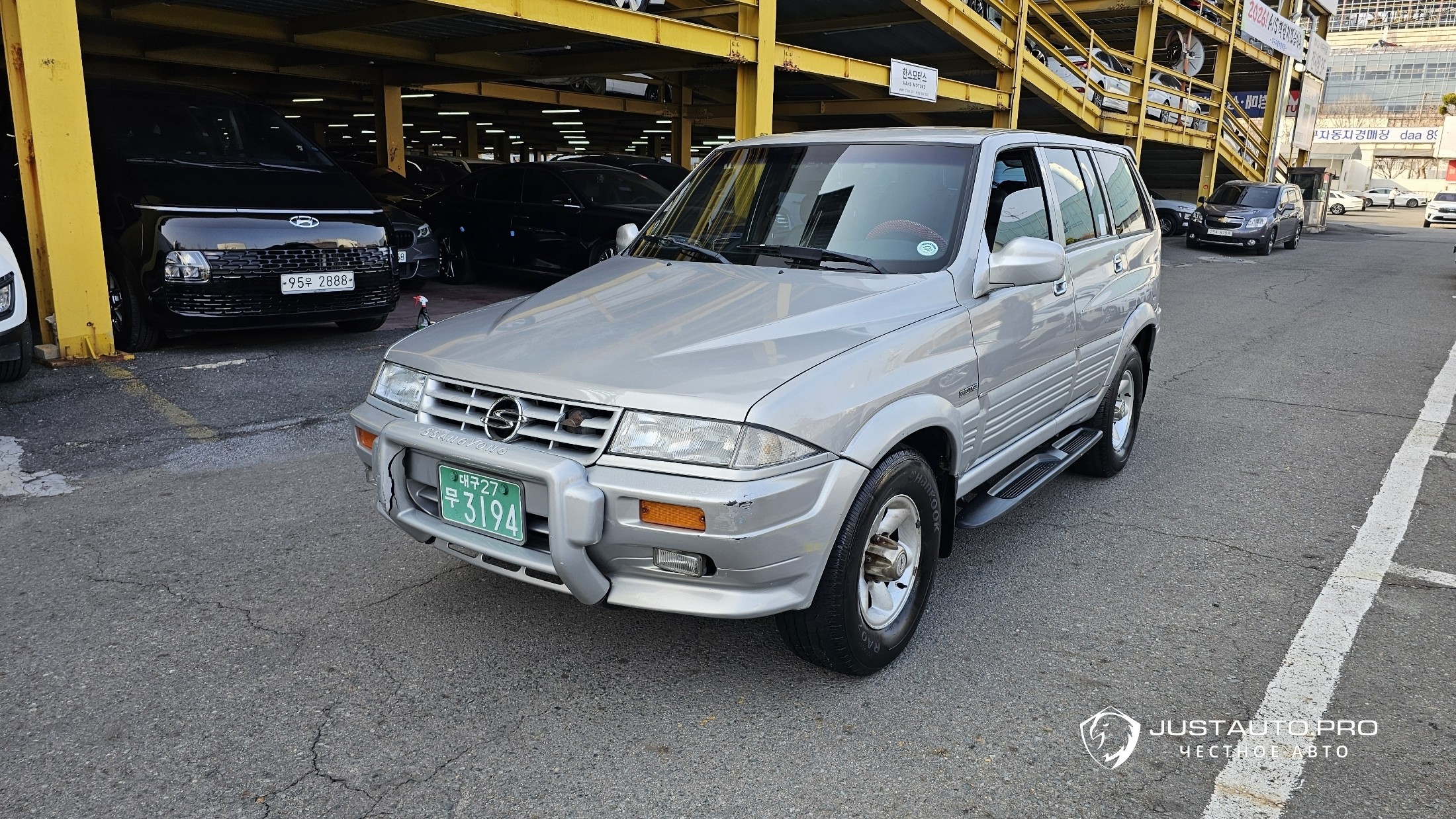Автомобиль KG_Mobility_Ssangyong Musso