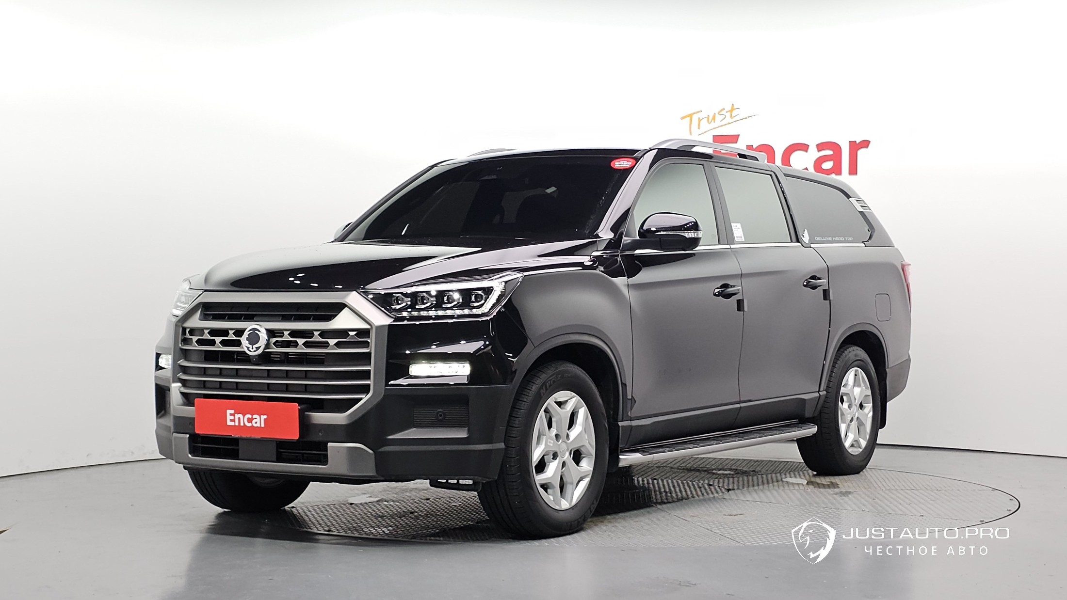 Автомобиль KG_Mobility_Ssangyong Musso