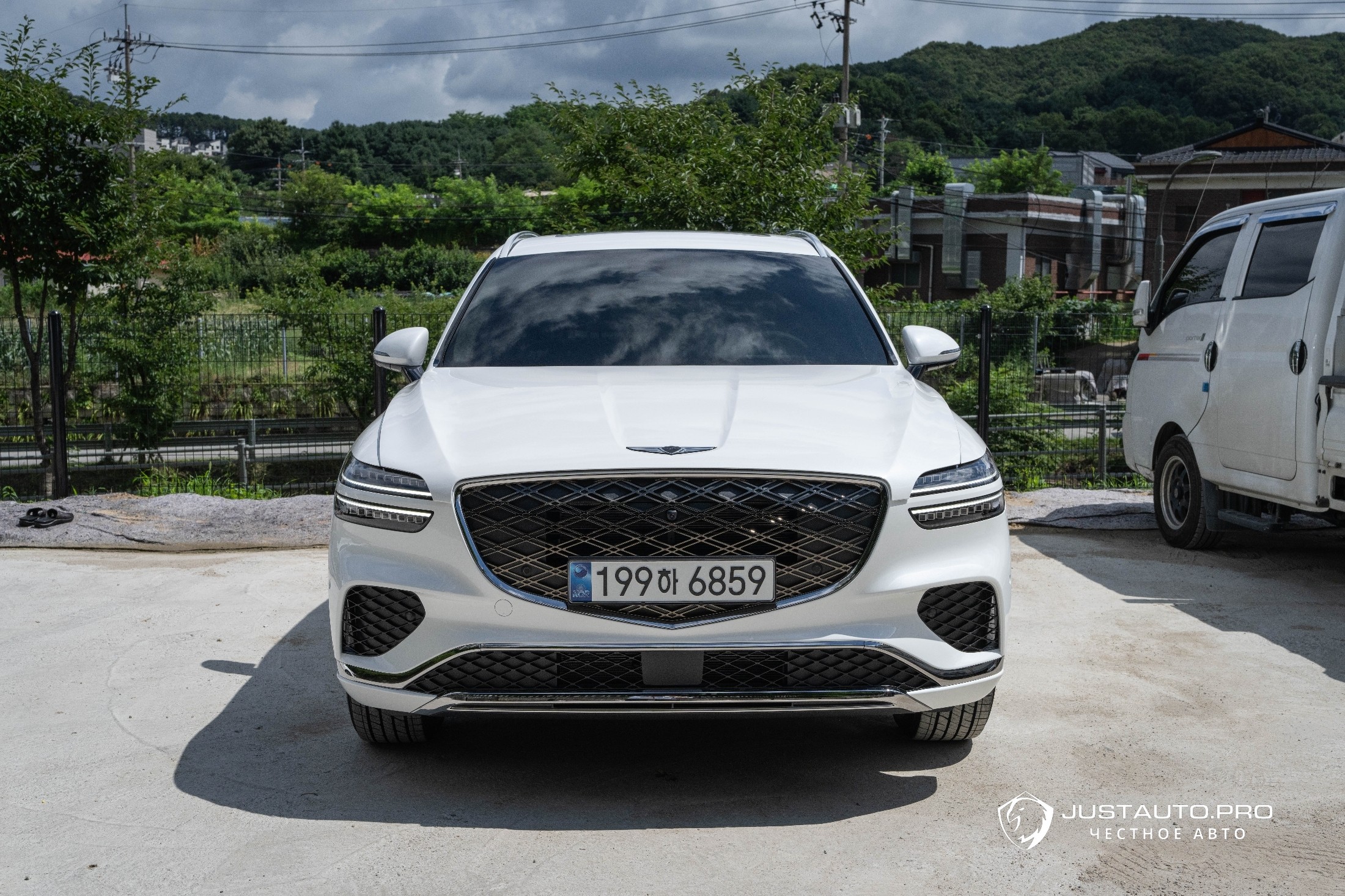 Автомобиль Genesis GV70